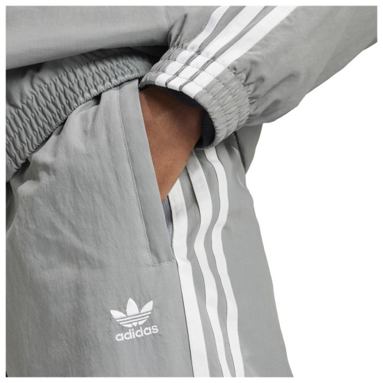 Adidas Γυναικείο παντελόνι φόρμας Woven Track Pants
